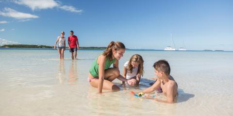 Family on beach in Bahamas