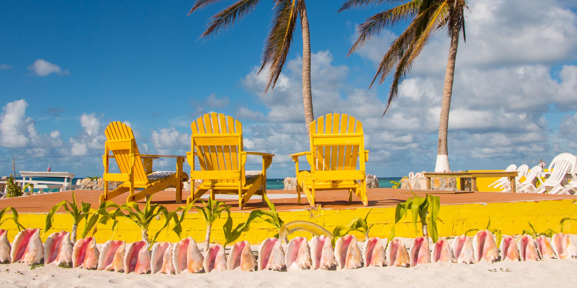 Colorful beach chairs at Cow Wreck Beach on Anegada, BVI